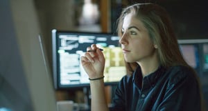 woman-looking-at-data-on-screen